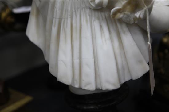 A late Victorian carved alabaster bust of a young girl holding a rose, 19in.